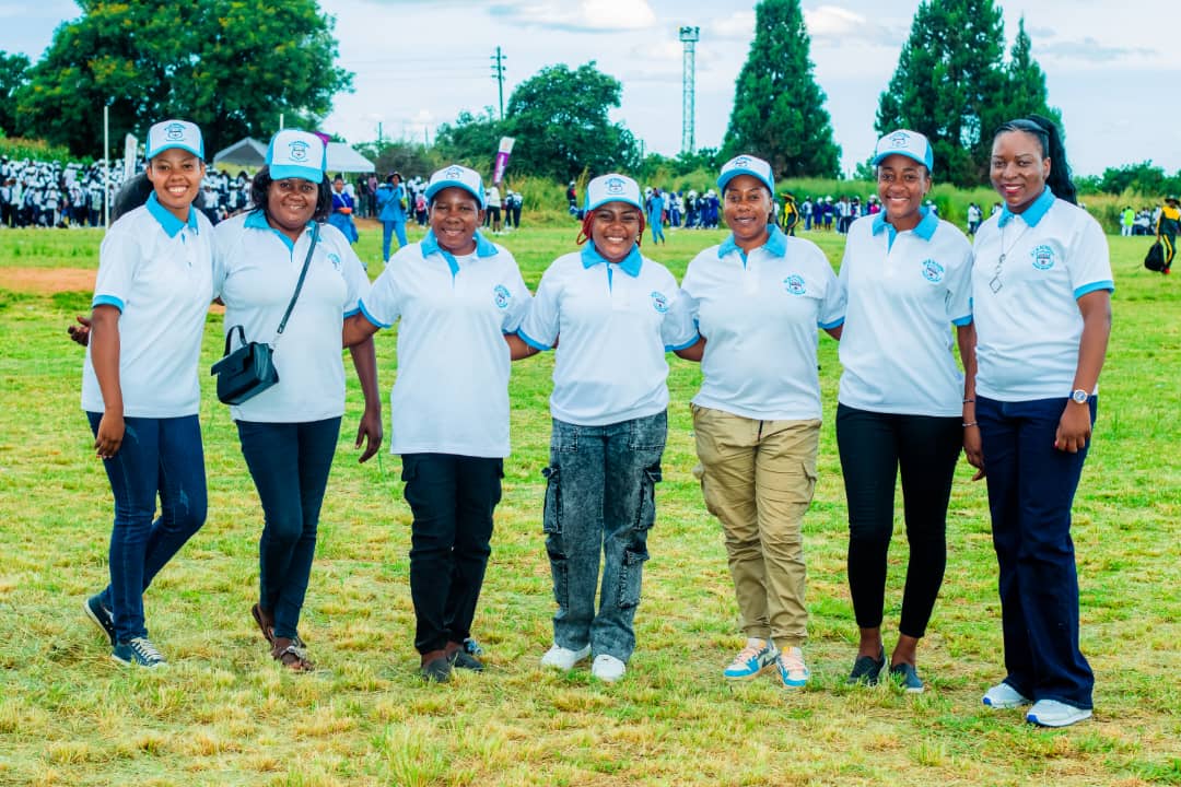 MFM Academy — Staff together on the sports field