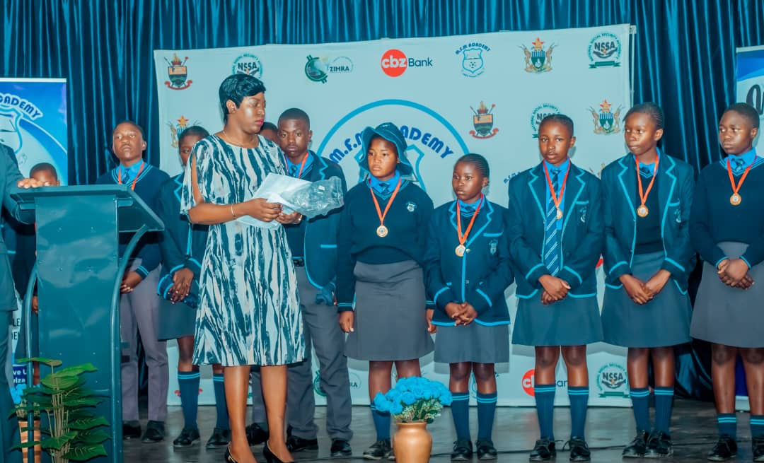 MFM Academy — Learner receiving recognition on stage