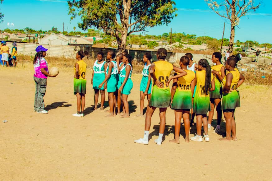 MFM Academy — Netball team lined up on the court