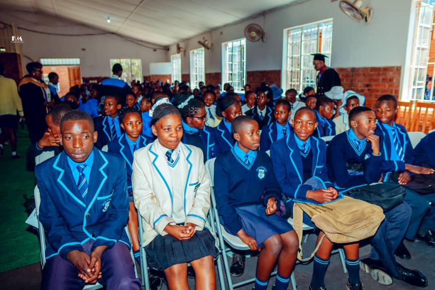 MFM Academy — Learners seated in the school hall
