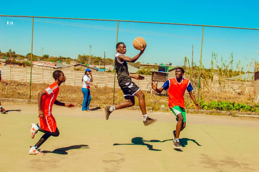 MFM Academy — A player jumping for the ball during a match