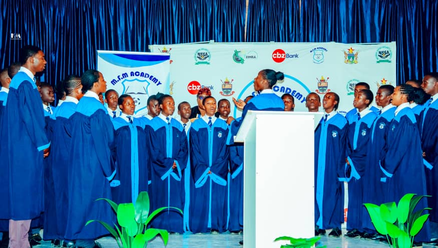 MFM Academy — School choir performing in blue robes