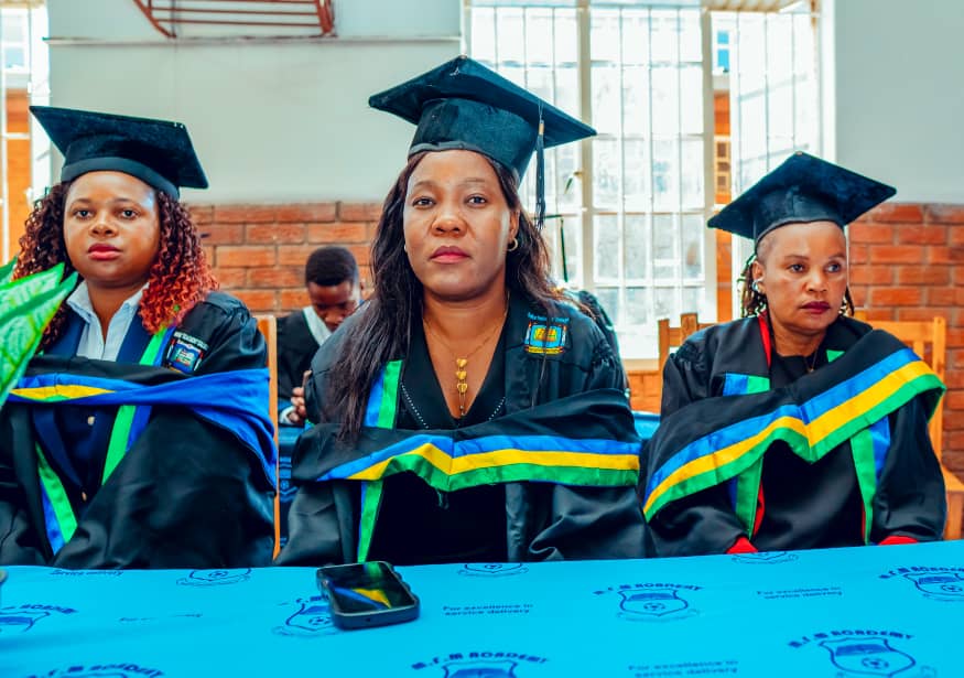 MFM Academy — Staff in academic dress at a ceremony
