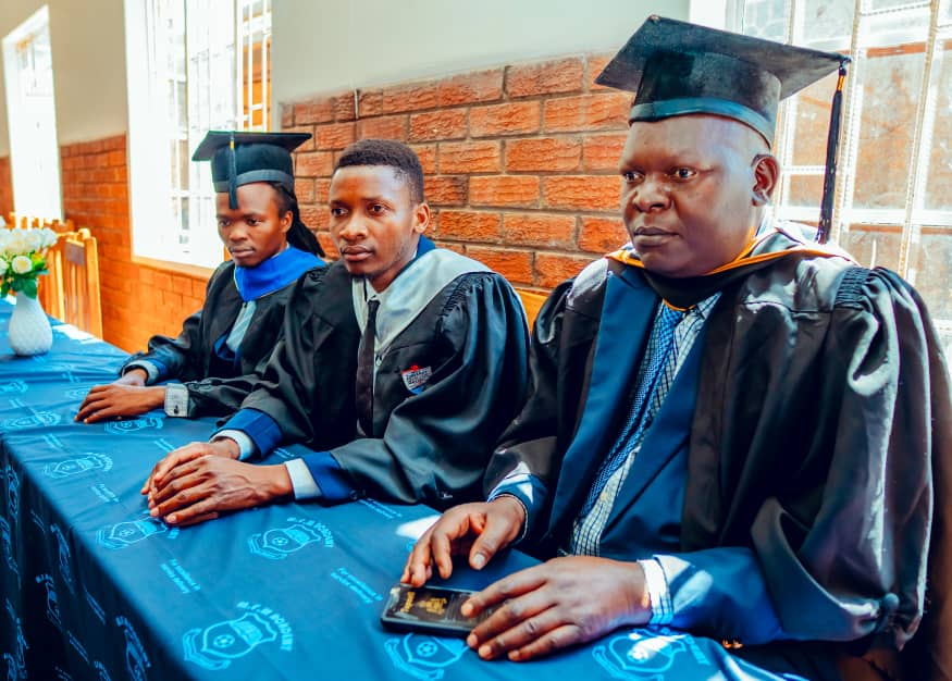 MFM Academy — Staff at the ceremony table
