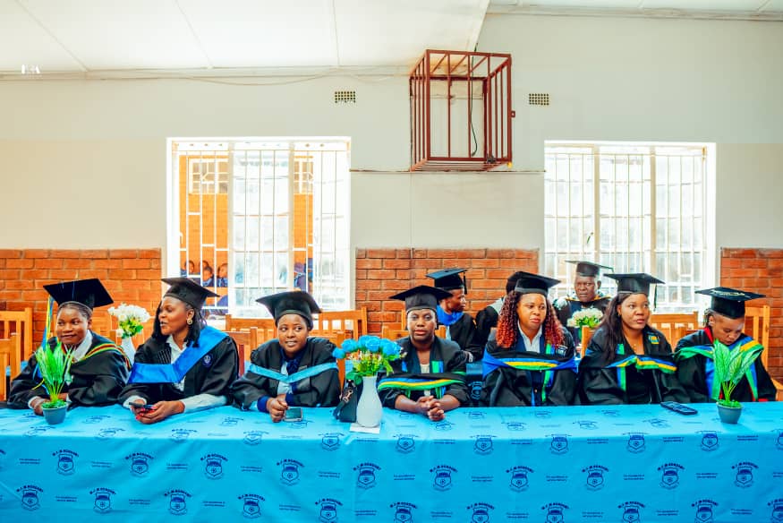 MFM Academy — Staff seated together in academic dress