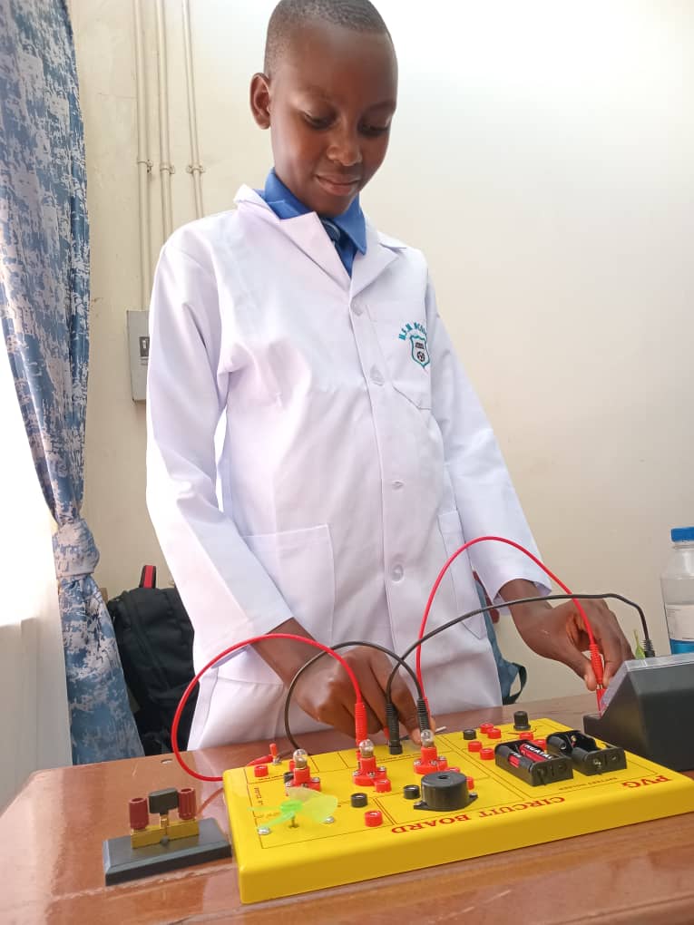 Student building a circuit in the science lab