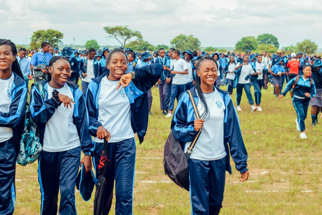 Students smiling at MFM Academy sports day